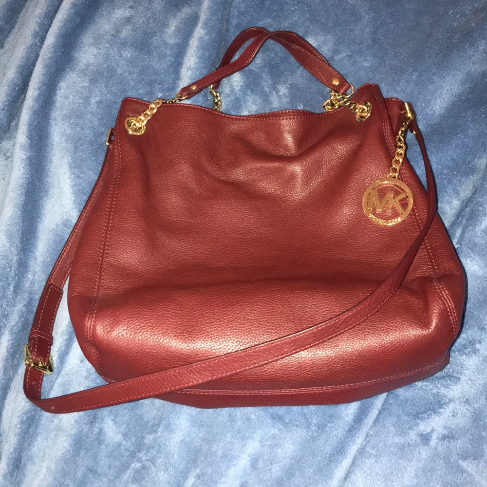 Michael Kors burgundy bag w/ gold chain detail